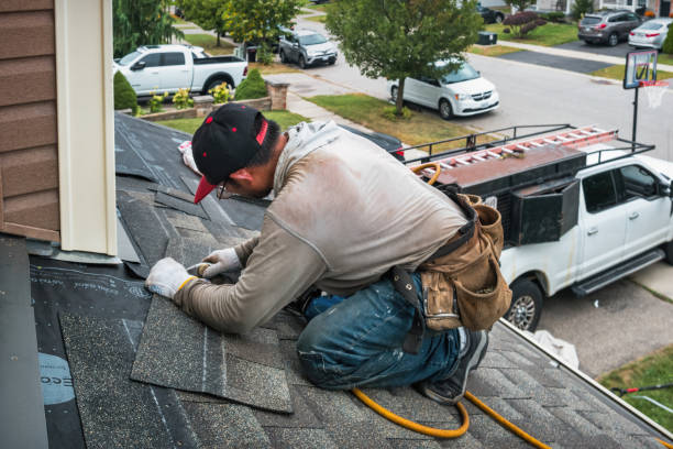 Professional Roofing technician working in Pepperell, MA